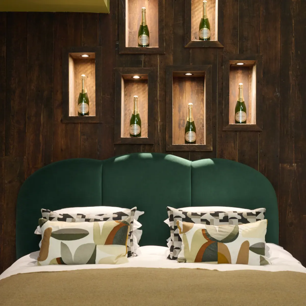 Black bathtub and white sink in a bathroom.