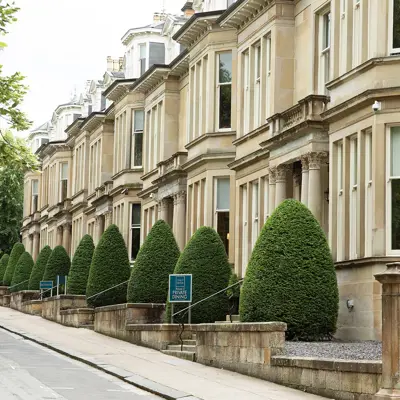 A row of houses lining a street.