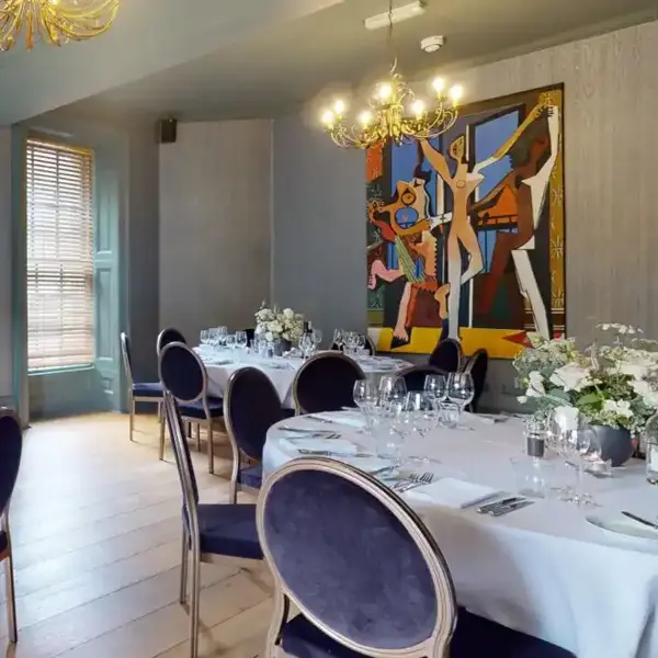 HDV Tunbridge Wells Private Dining with round back chairs and gold chandelier 