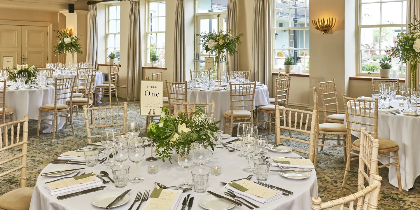 Dining room featuring a prominent wall painting.