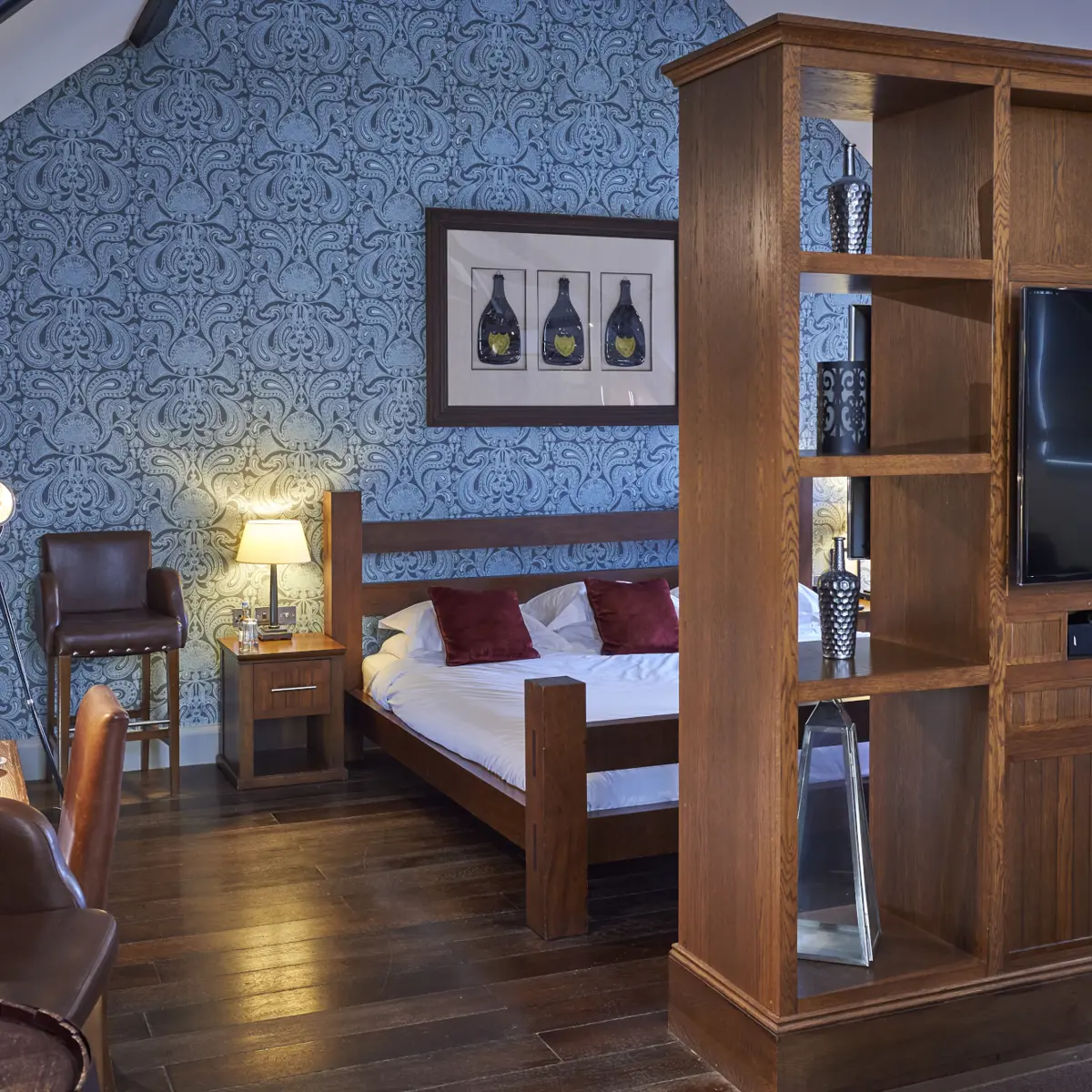 Bedroom featuring a comfortable bed and television.