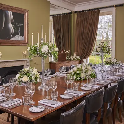 Formally set dining room table for an elegant dinner.