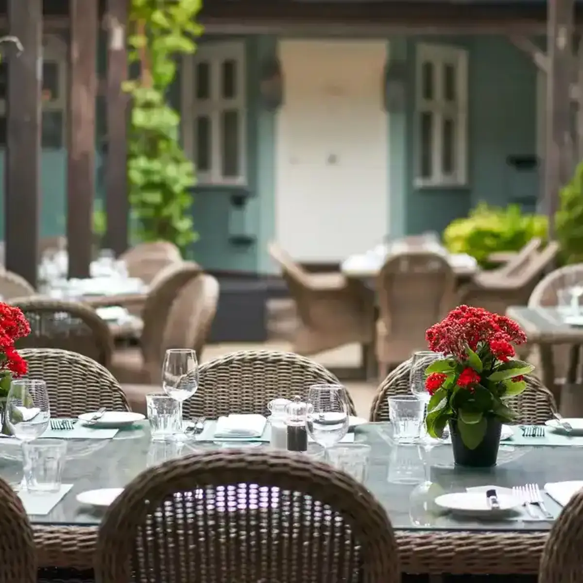 Tables adorned with vases filled with flowers.