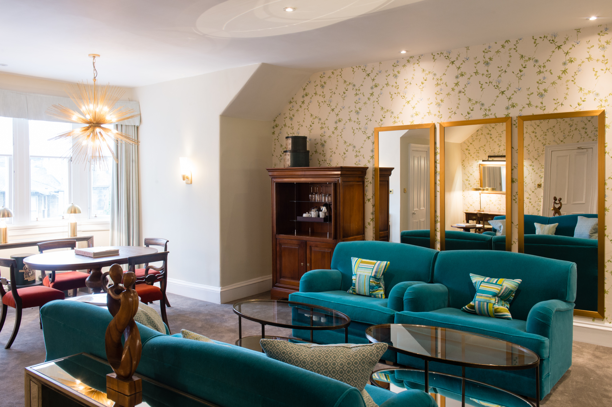 A well-furnished living room with a dining table.