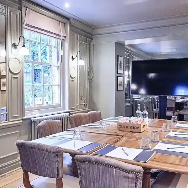 Dining room featuring a table and chairs.