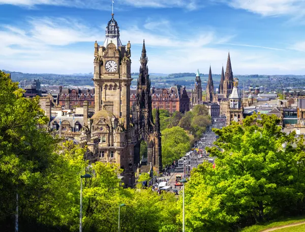 A towering clock tower overlooking a cityscape.