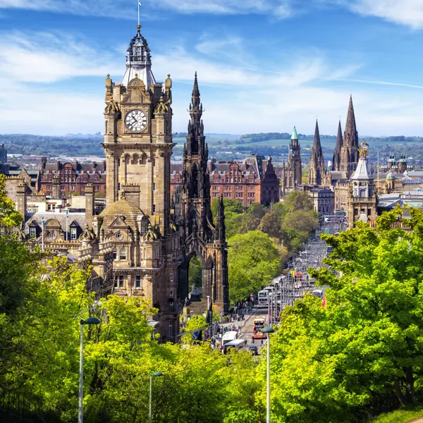 A towering clock tower overlooking a cityscape.