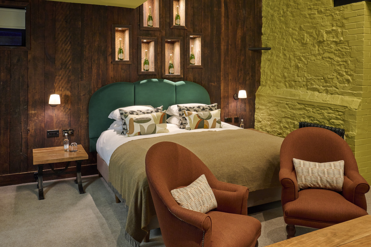 A well-furnished living room featuring a comfortable couch and a television.