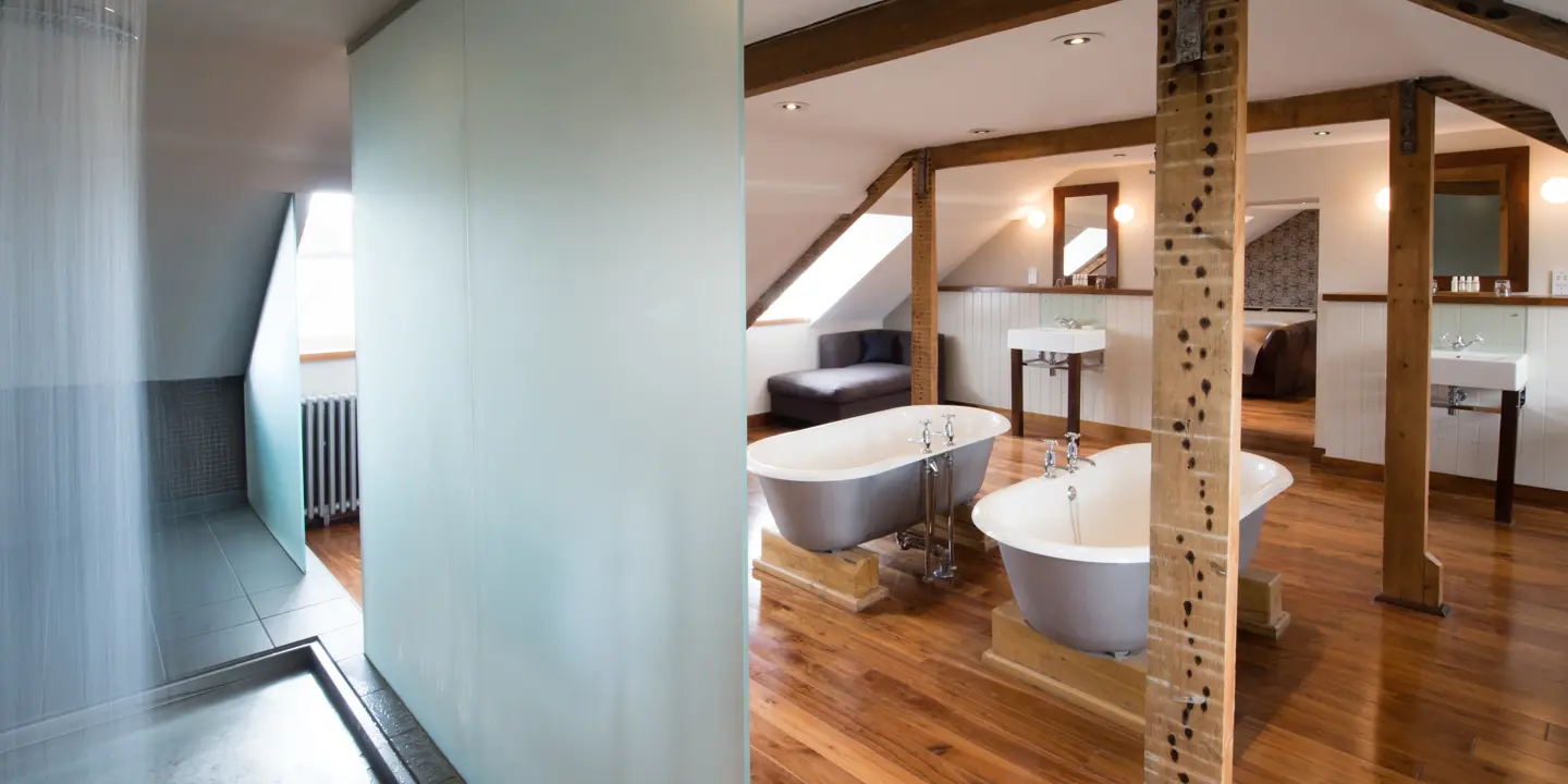 Bathroom featuring a bathtub and showerhead.