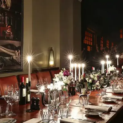 HDV Edinburgh Private Dining with candles on a long table and wall art (3)