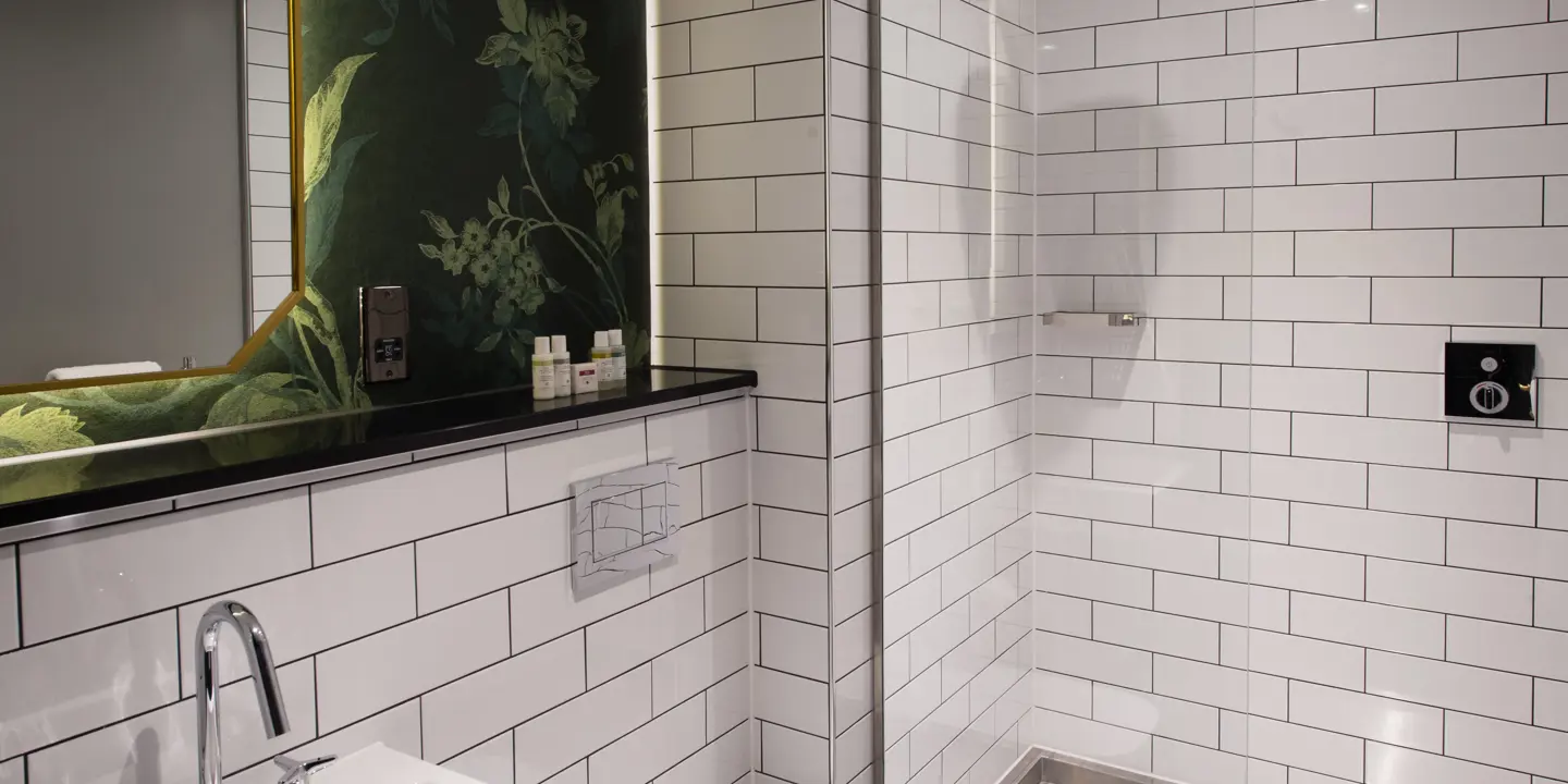 Bathroom featuring a sink and mirror.