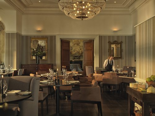 Bistro at Cannizaro House with a waitress setting up a table