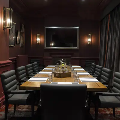 A long table arranged in the center of a room