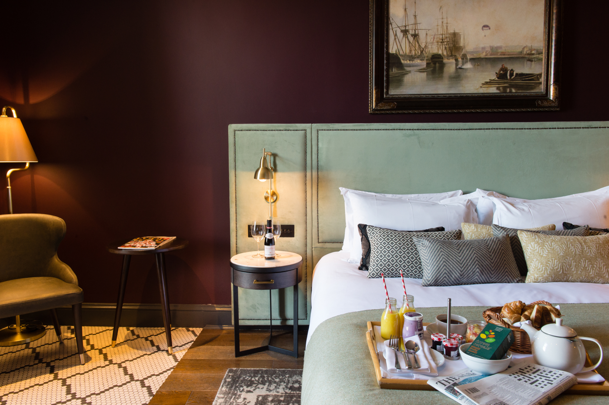 Breakfast tray on a bed.