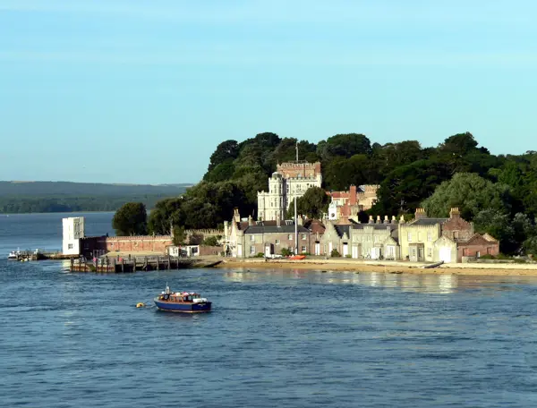 A small boat positioned in the midst of a body of water.