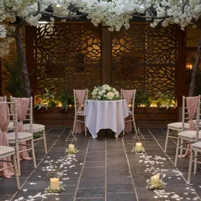 A room filled with numerous chairs and tables.