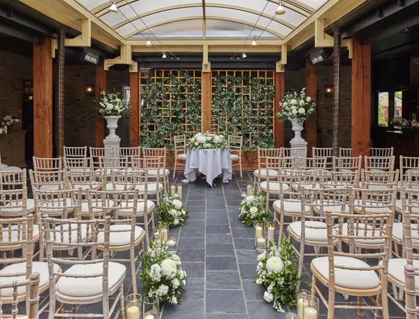 A room filled with numerous chairs and tables.